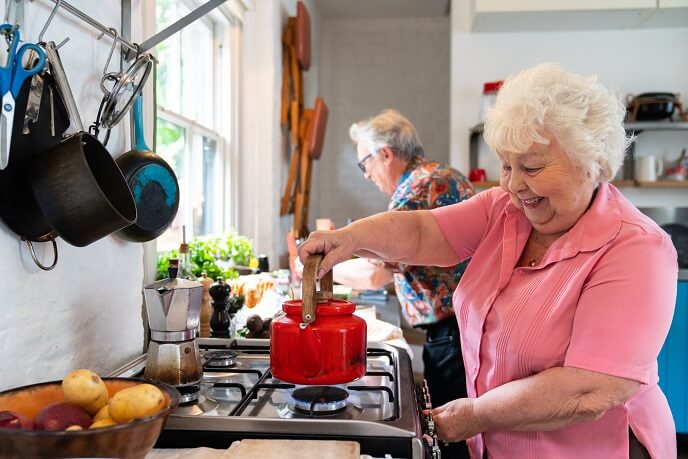 Mother preparing dinner in the kitchen