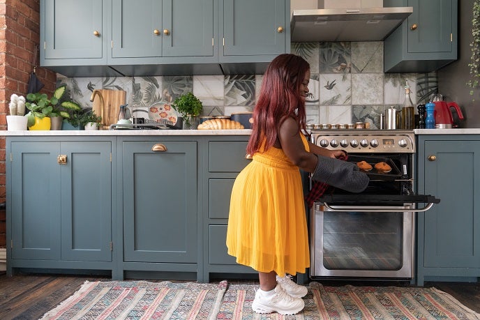 Mother preparing dinner in the kitchen